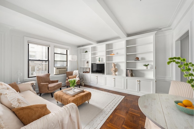 living area with cooling unit and beam ceiling