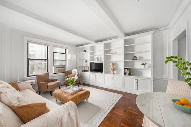 living room featuring cooling unit and beamed ceiling