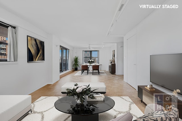 living room with rail lighting