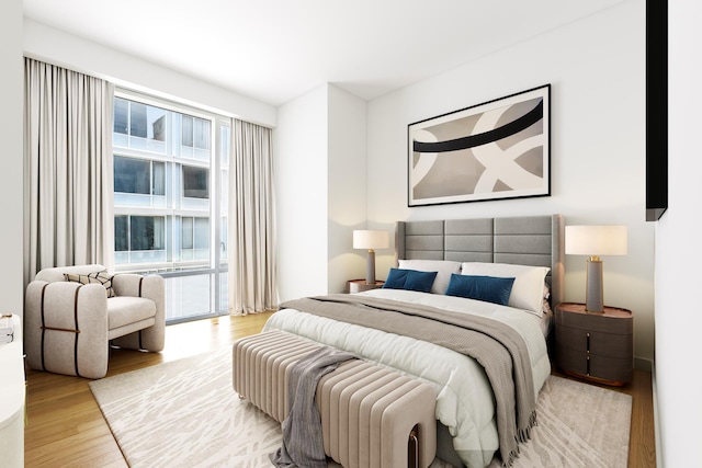 bedroom featuring wood finished floors