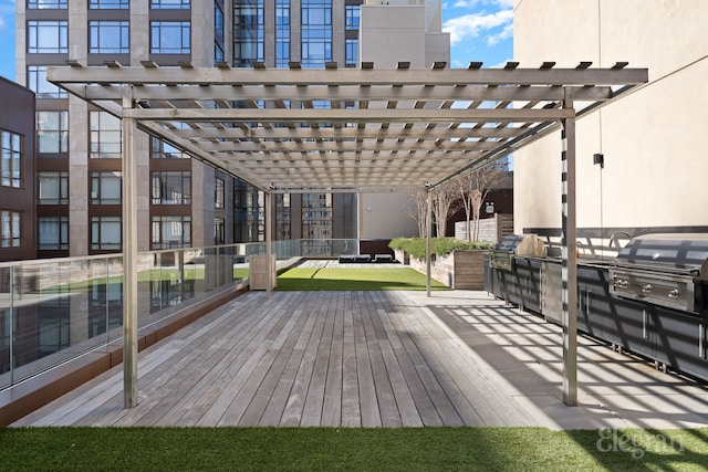 wooden terrace featuring area for grilling and a pergola