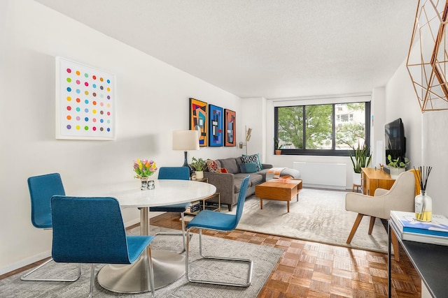 living room with a textured ceiling