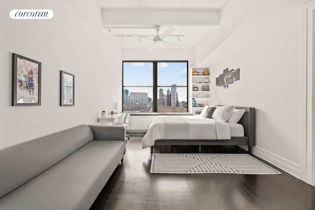 70 Washington St Unit 9G, New York City, NY 11201 - bedroom featuring beamed ceiling, wood finished floors, a city view, and a ceiling fan