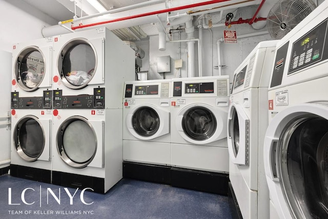 shared laundry area featuring stacked washer / drying machine and washing machine and clothes dryer