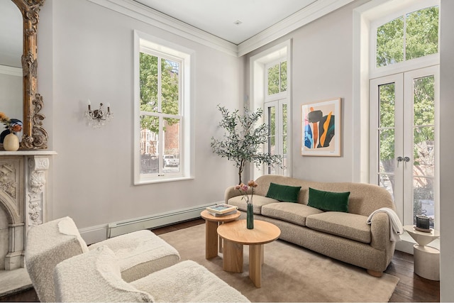 living area featuring baseboard heating, french doors, crown molding, and wood finished floors