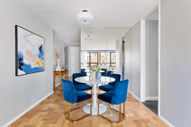 dining room featuring baseboards