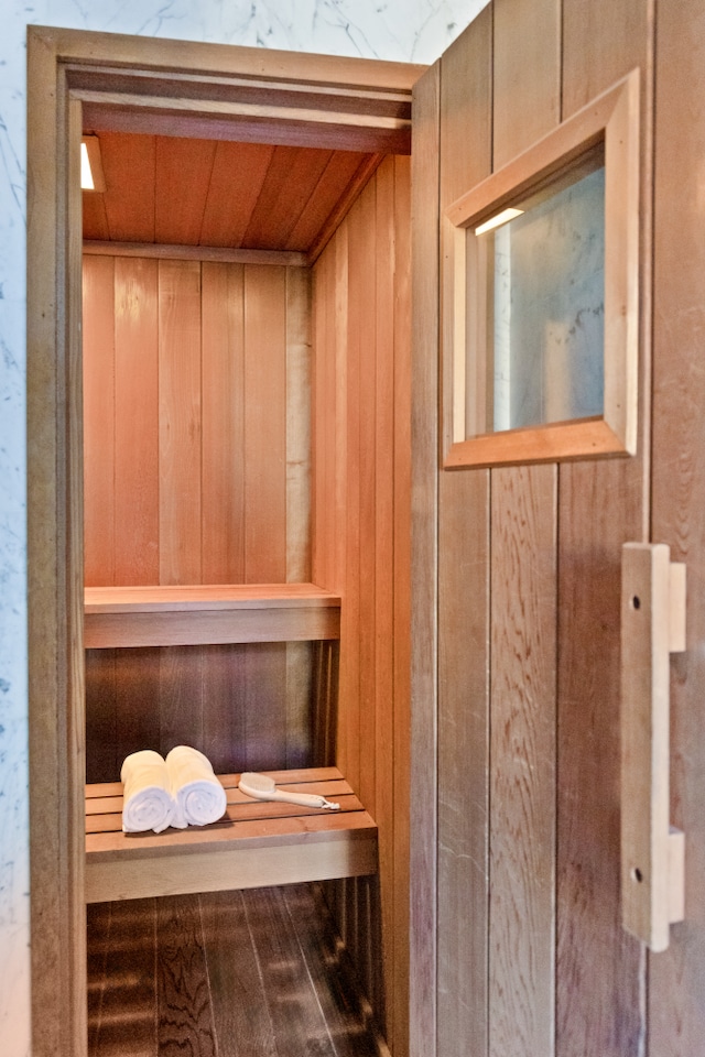 view of sauna featuring wood finished floors
