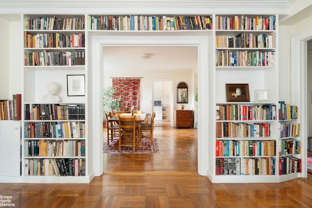 living area with bookshelves