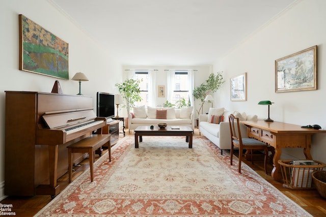 living area featuring ornamental molding