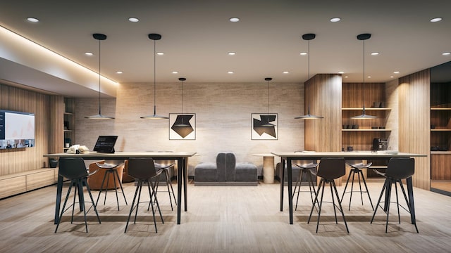 dining room with recessed lighting and light wood-type flooring