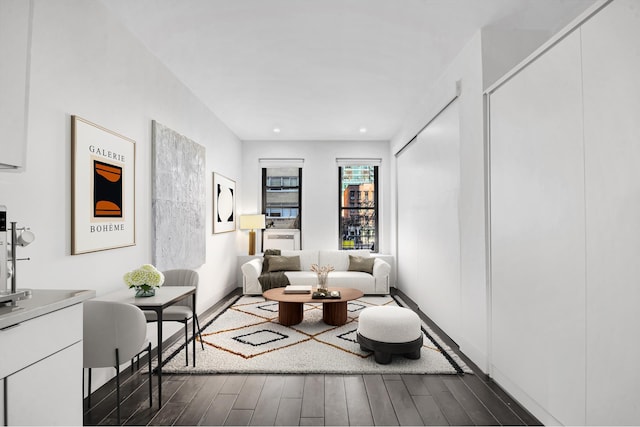 237 E 54th St Unit 2B, New York City, NY 10022 - living area with wood finished floors and recessed lighting