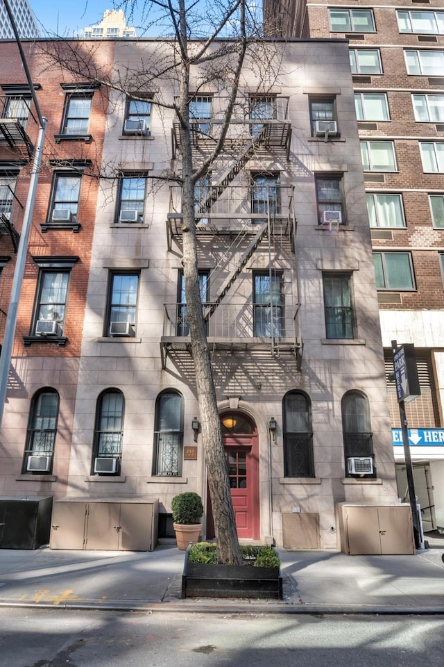 237 E 54th St Unit 2B, New York City, NY 10022 - view of apartment building / complex featuring cooling unit