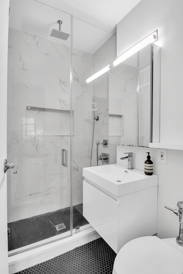 237 E 54th St Unit 2B, New York City, NY 10022 - full bathroom with a marble finish shower and vanity