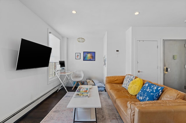 living area with recessed lighting, a baseboard radiator, and dark wood finished floors