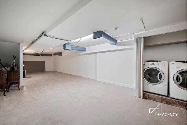 146 W 136th St, New York City, NY 10030 - washroom featuring separate washer and dryer and baseboards