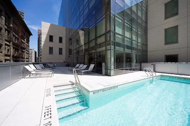 pool with a patio