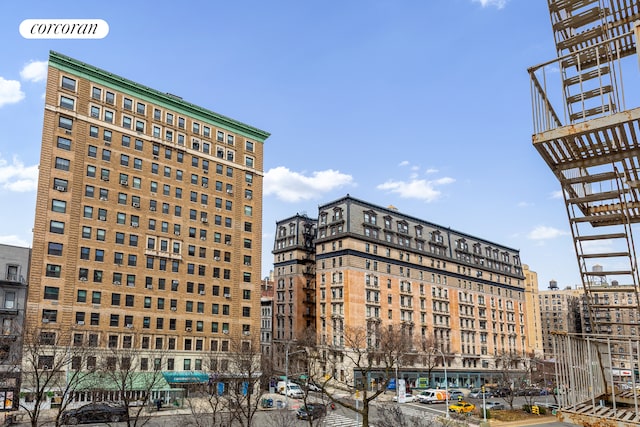 view of building exterior featuring a city view