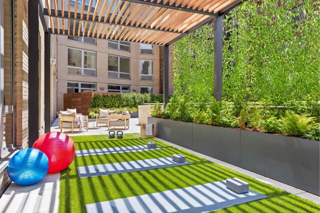 view of yard with a patio, a pergola, and an outdoor hangout area