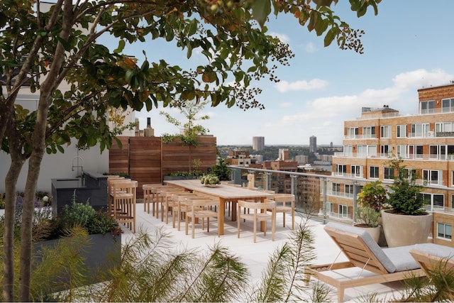 balcony with outdoor dining area
