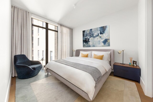 2505 Broadway Unit 7B, New York City, NY 10025 - full bath featuring tile walls, a shower stall, toilet, and a sink