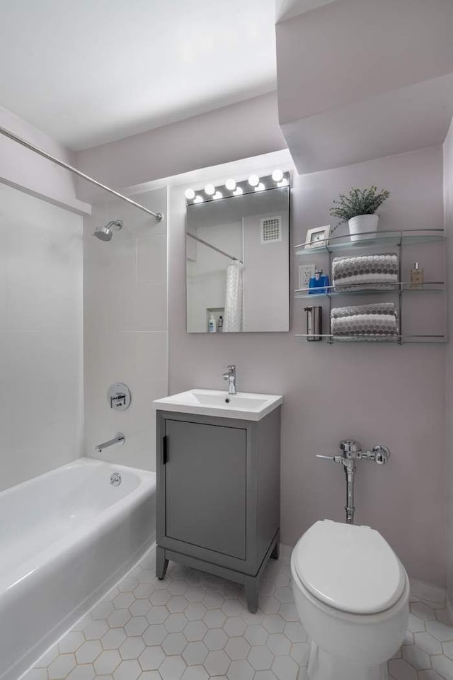 full bath featuring visible vents, shower / bath combination with curtain, vanity, and toilet