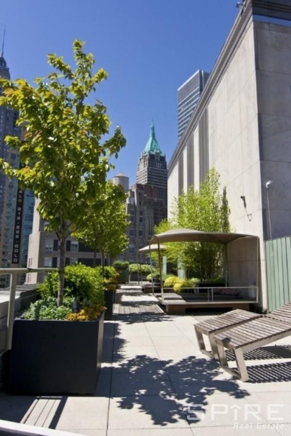 99 John St Unit 1012, New York City, NY 10038 - surrounding community with a city view