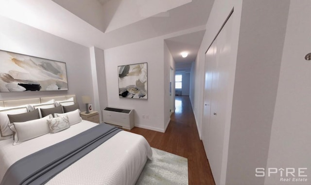 99 John St Unit 1012, New York City, NY 10038 - bedroom featuring wood finished floors and baseboards
