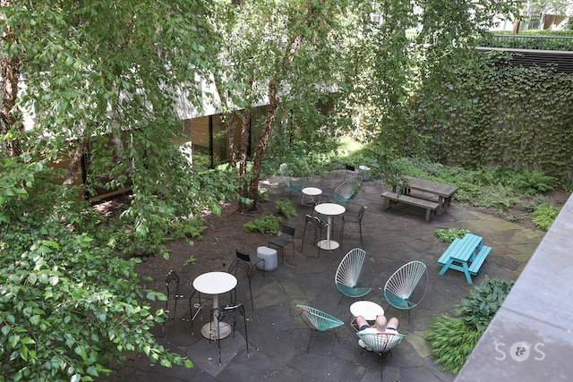 view of patio / terrace featuring fence