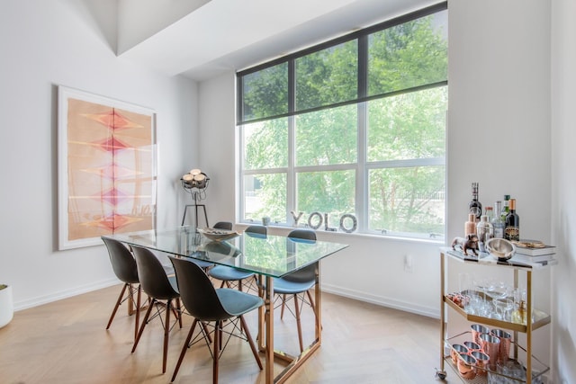 dining space with baseboards