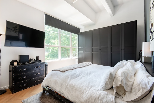 bedroom with beamed ceiling