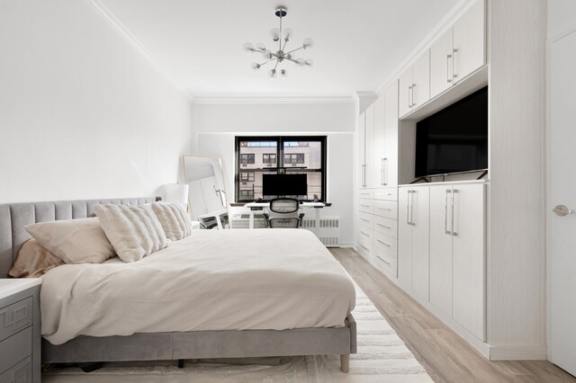 357 E 57th St Unit 16B, New York City, NY 10022 - bedroom featuring ornamental molding, light wood finished floors, radiator heating unit, a chandelier, and baseboards