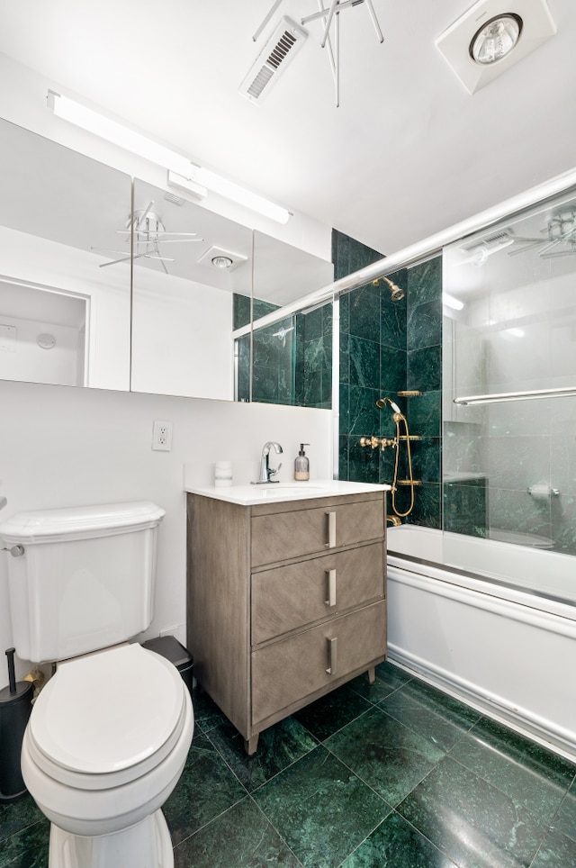 full bathroom featuring vanity, toilet, visible vents, and enclosed tub / shower combo