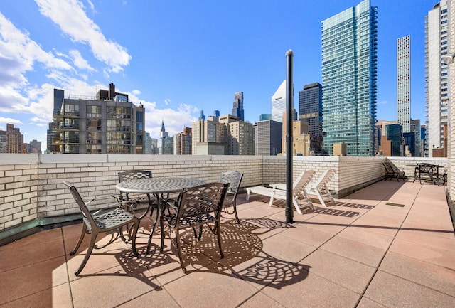 view of patio with a city view