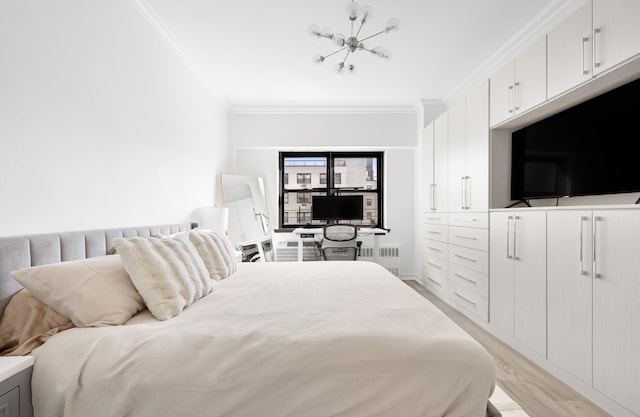 bedroom with radiator heating unit, light wood finished floors, ornamental molding, and an inviting chandelier