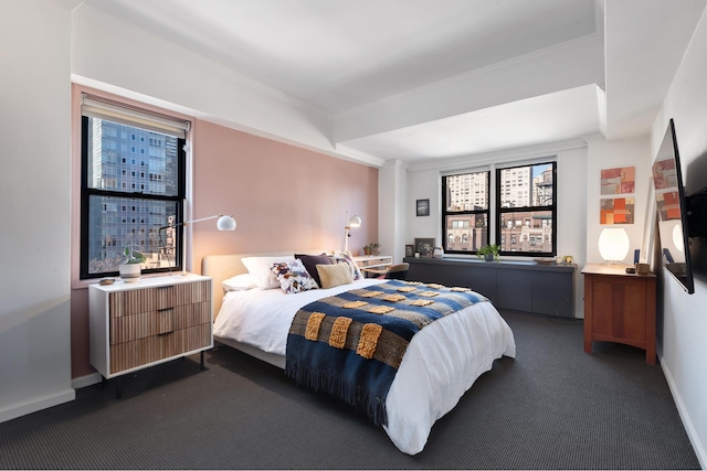 345 E 52nd St Unit 12F, New York City, NY 10022 - carpeted bedroom featuring baseboards and ornamental molding