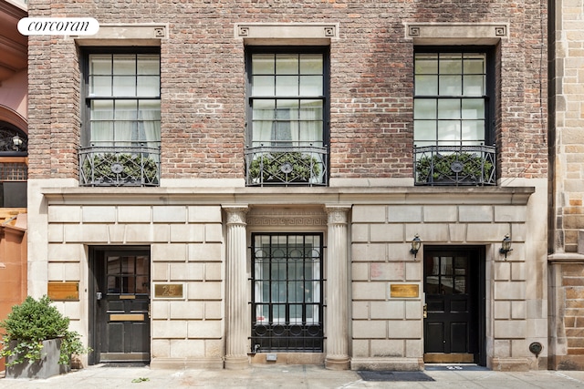 25 E 69th St Unit 3A, New York City, NY 10021 - property entrance with stone siding