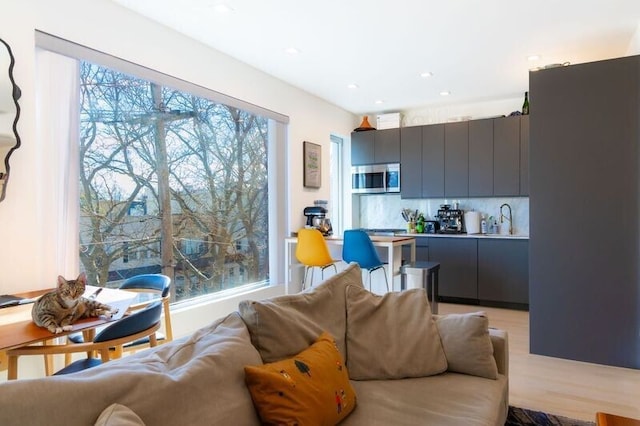 living area with recessed lighting