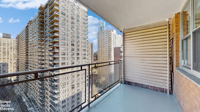 balcony featuring a view of city