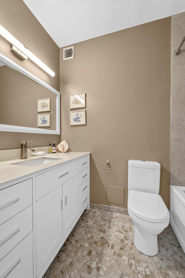 full bath featuring visible vents, toilet, and vanity