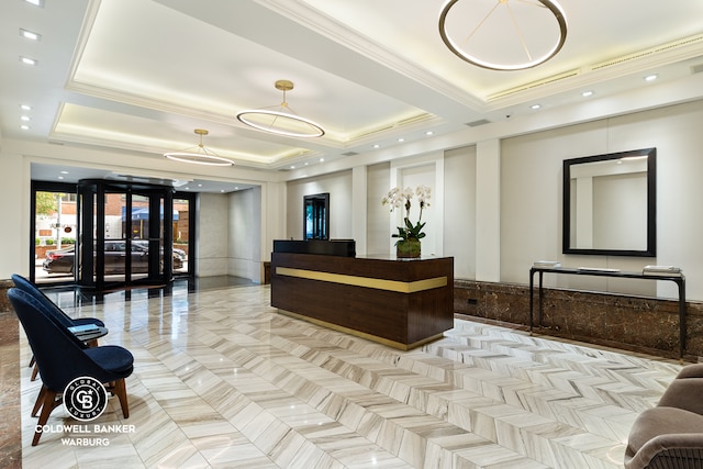 reception area with crown molding