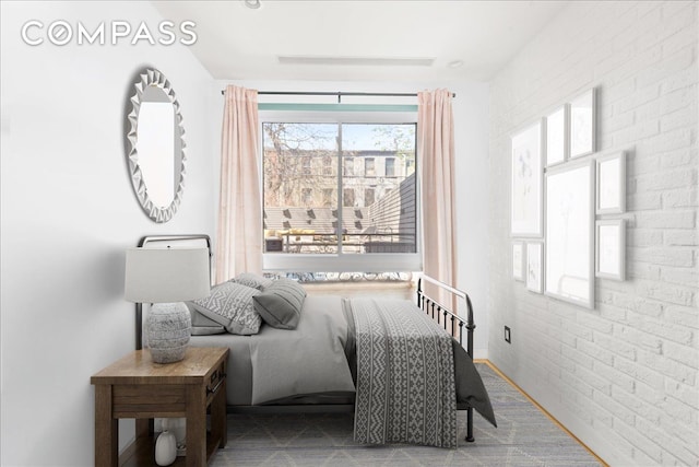 577 Madison St Unit 1B, New York City, NY 11221 - bedroom with brick wall