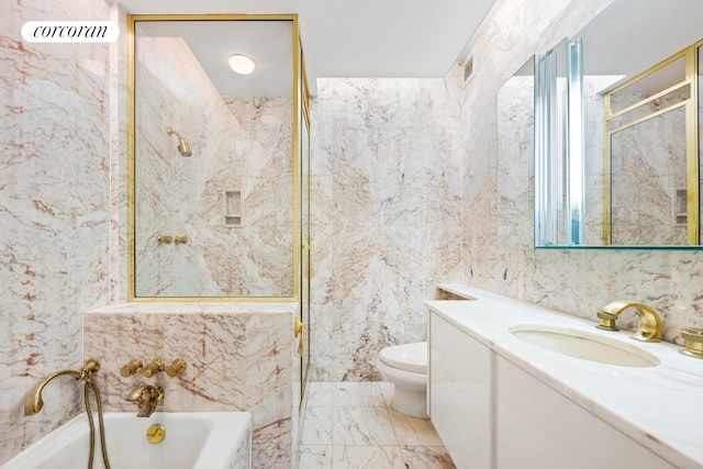 full bathroom with a garden tub, vanity, toilet, and tile walls