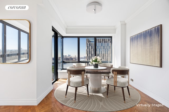 dining area featuring visible vents, baseboards, a view of city, and crown molding