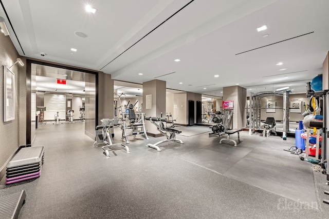 exercise room with recessed lighting