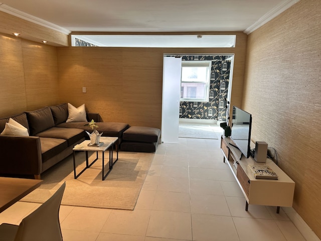 living area featuring light tile patterned floors and ornamental molding