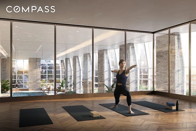 515 W 18th St Unit 403, New York City, NY 10011 - workout area featuring a wall of windows