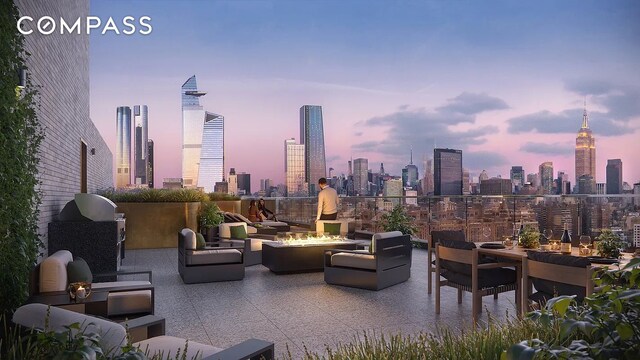 515 W 18th St Unit 403, New York City, NY 10011 - patio terrace at dusk featuring a view of skyline and an outdoor living space with a fire pit