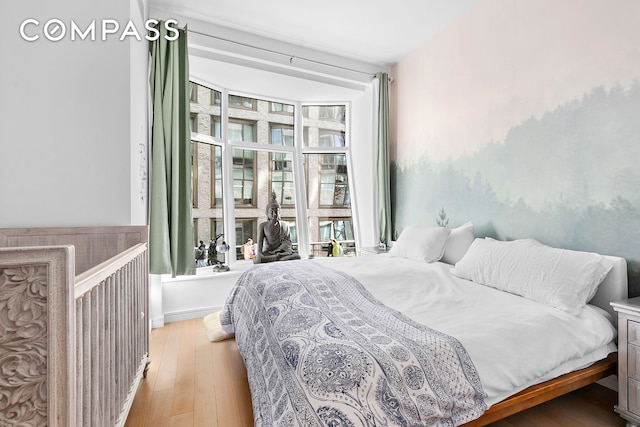 bedroom featuring light wood finished floors