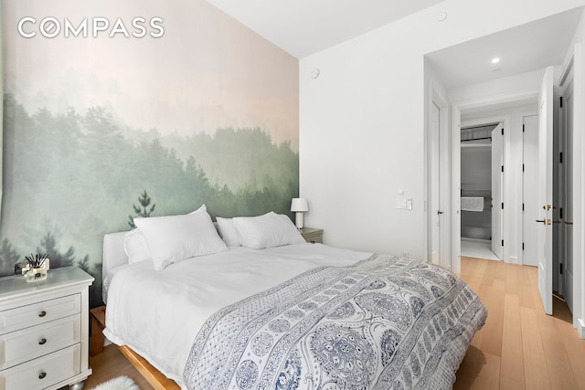 bedroom featuring light wood-type flooring