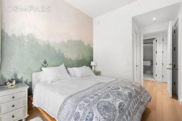 515 W 18th St Unit 403, New York City, NY 10011 - bedroom featuring light wood-style floors